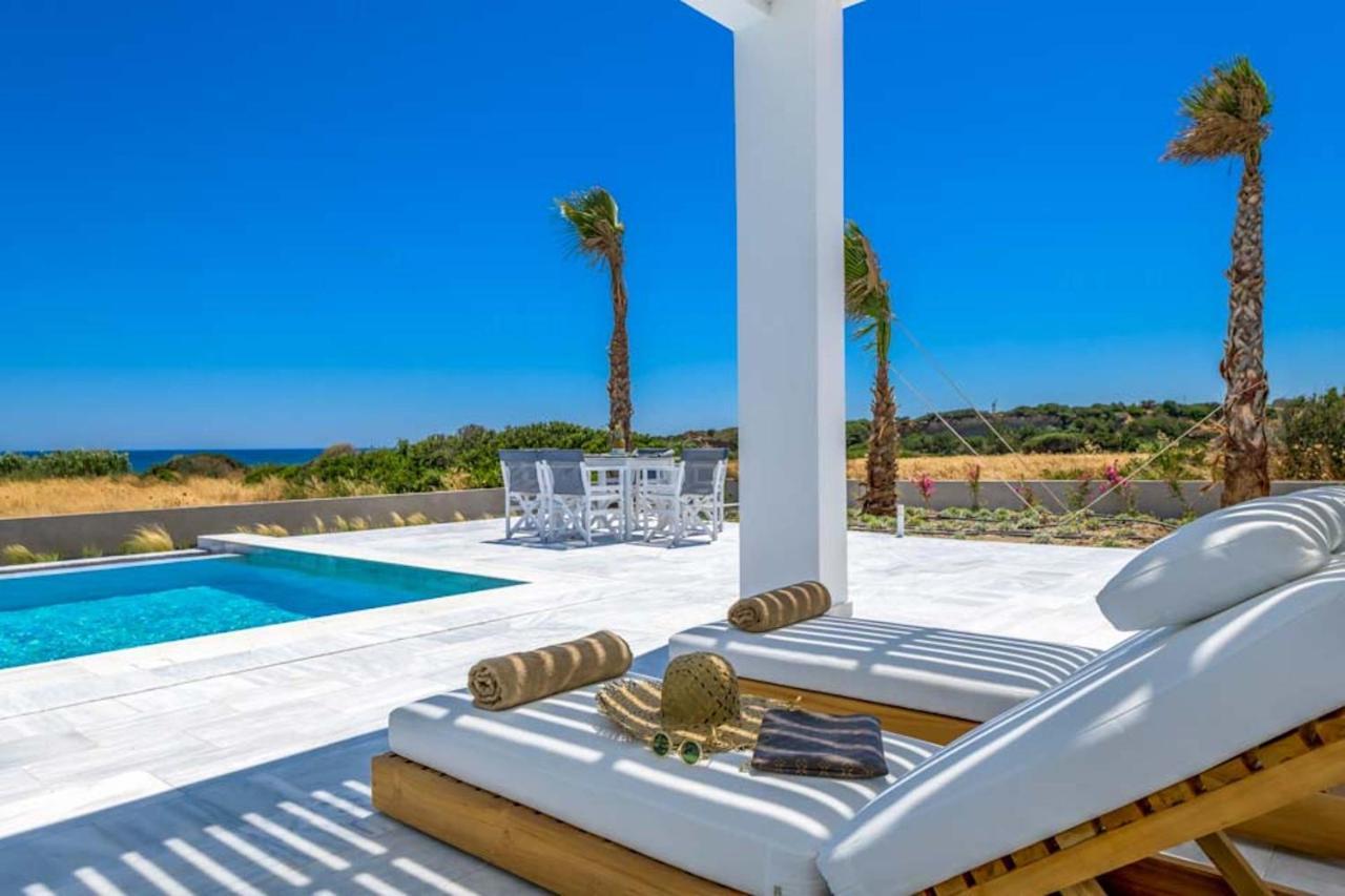 Seashore Beachfront Villa Lakhania Bagian luar foto