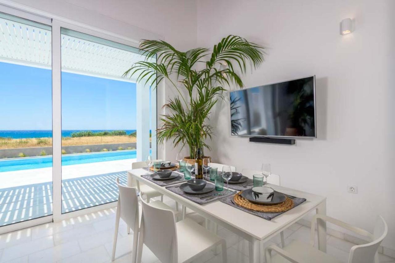 Seashore Beachfront Villa Lakhania Bagian luar foto