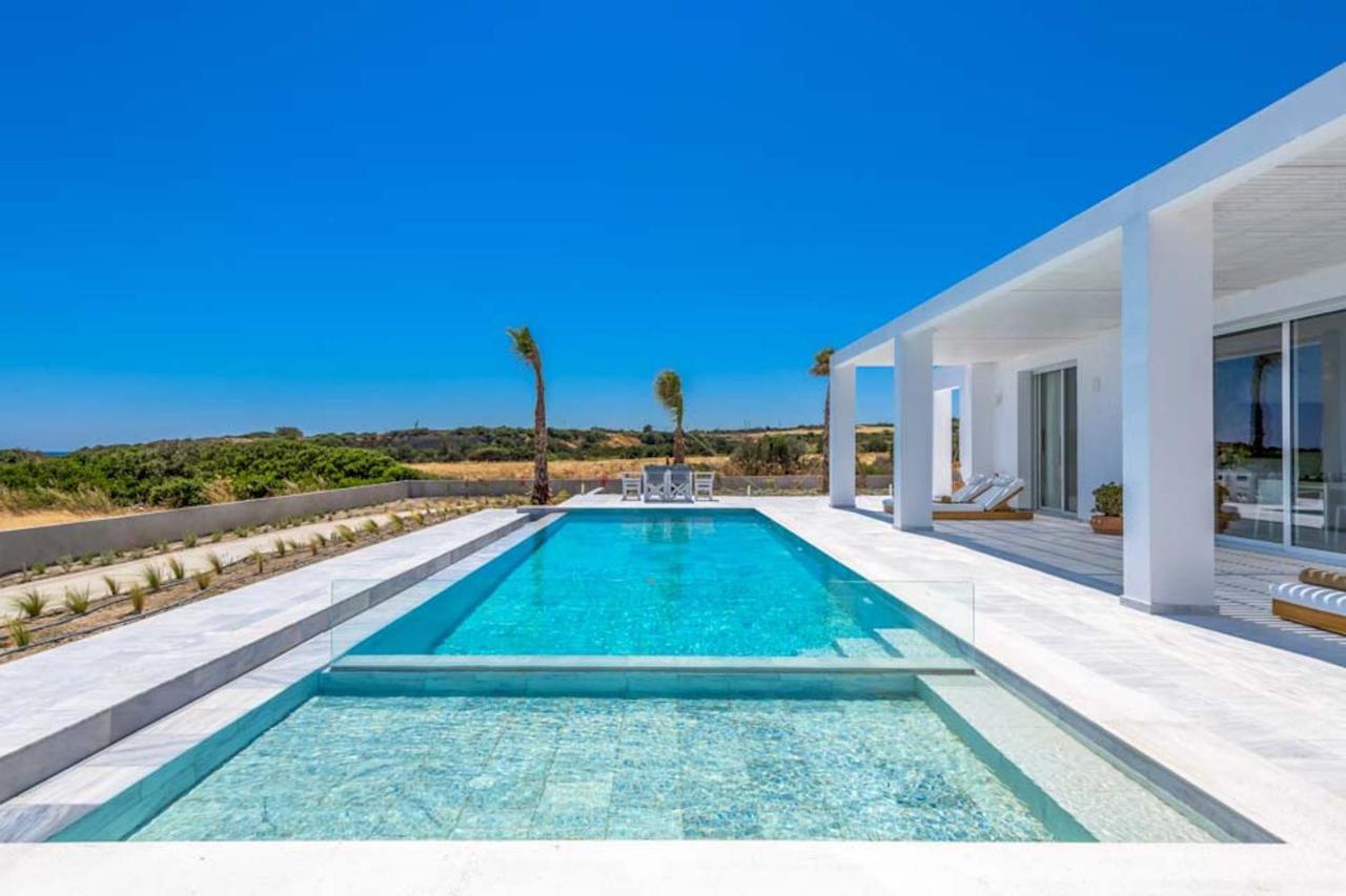 Seashore Beachfront Villa Lakhania Bagian luar foto